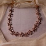 Vasantha  Pushpa Mala With Stud Earrings
